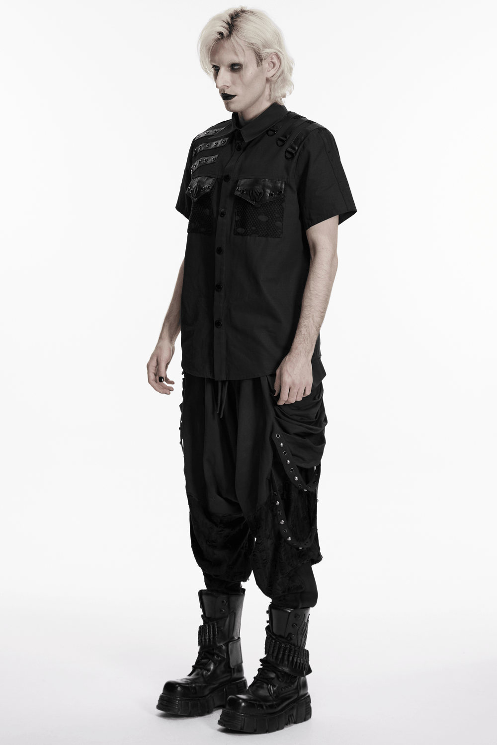 Punk Distressed Shirt with D-Ring Shoulder Loops styled with dark pants and boots for a bold punk look.
