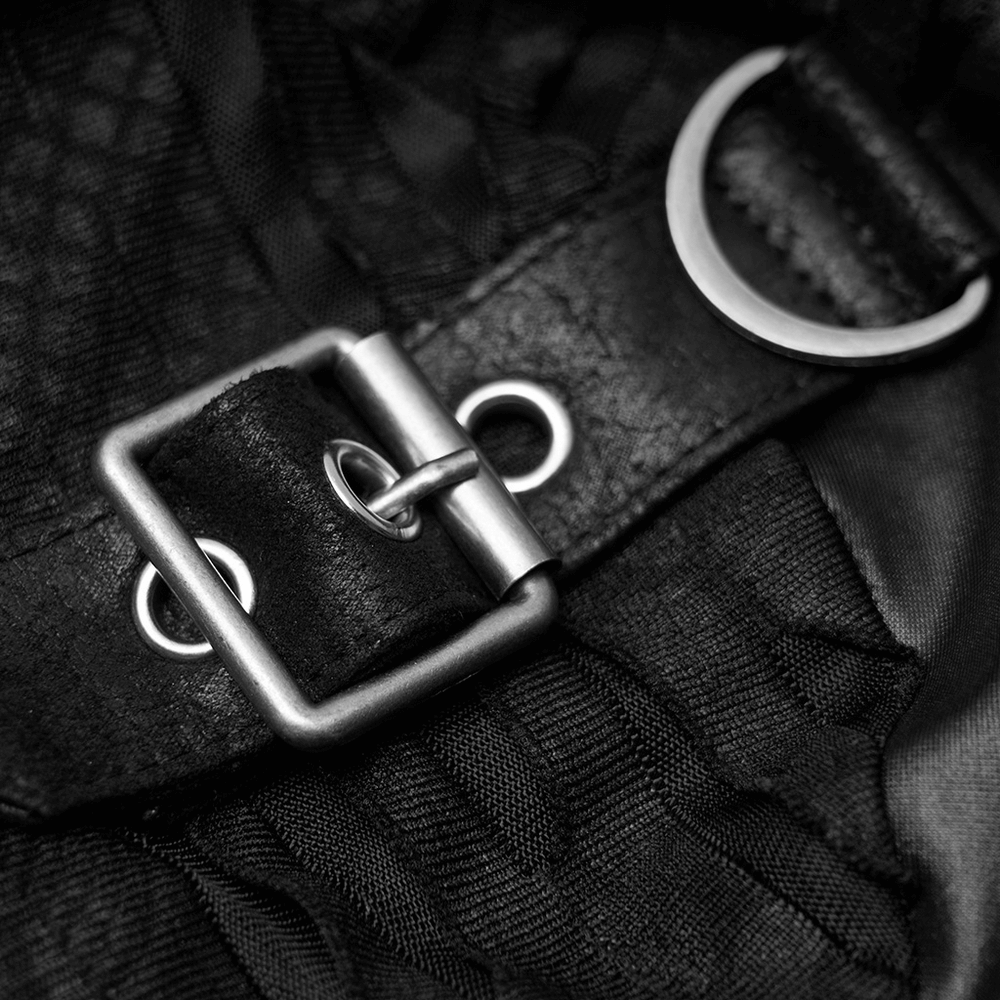 Close-up of a black strap buckle with metal details, perfect for punk fashion and gothic styles.