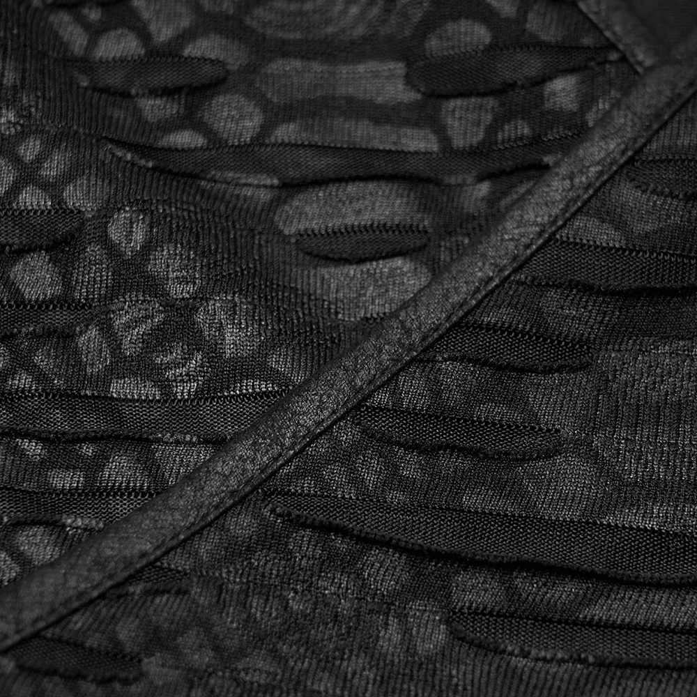 Close-up of punk distressed black fabric with ripped details, showcasing edgy Gothic style and unique texture.