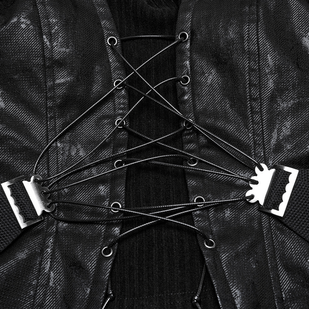Close-up of lace-up detail on a black punk tube top showcasing metal hardware and drawstring accents.
