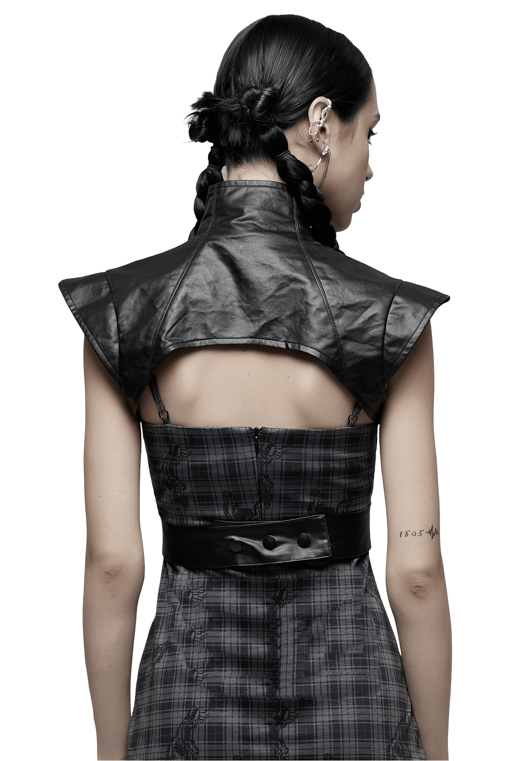 Back view of a punk edgy black PU leather vest with wide shoulders and detachable waistband, showcasing its unique design.
