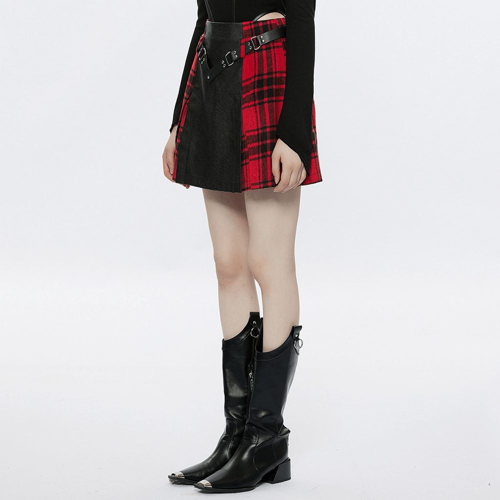 Punk faux leather and plaid splice mini skirt with rivet belt and stylish black combat boots.