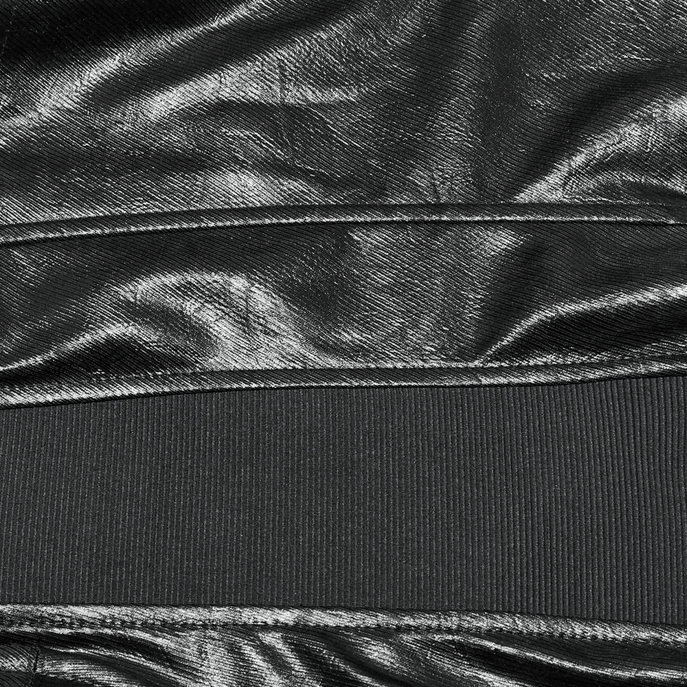 Close-up of punk faux leather corset fabric with shiny texture and elastic band detail for a stylish edgy look.