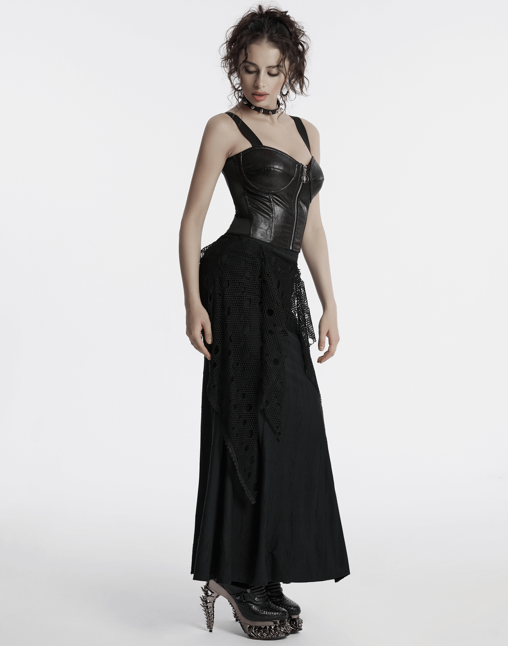 Punk faux leather corset with adjustable straps, paired with a black maxi skirt, for an edgy look.