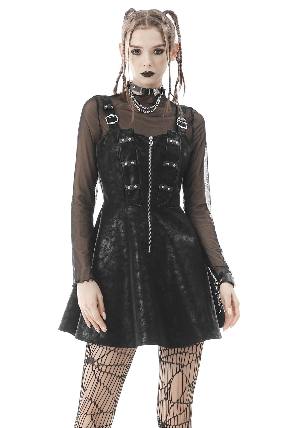 Women’s punk faux leather mini dress with rivet and zipper accents, paired with fishnet tights for a edgy, chic look.