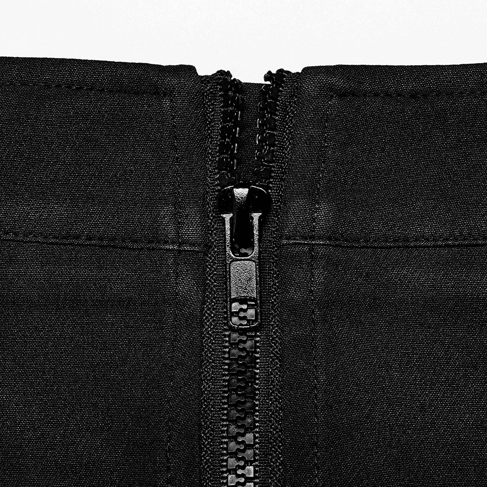 Close-up of a black zipper on a punk-style skirt showcasing sleek design and edgy details.