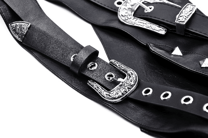 Close-up of a punk black PU leather corset belt featuring ornate silver buckles and studs.