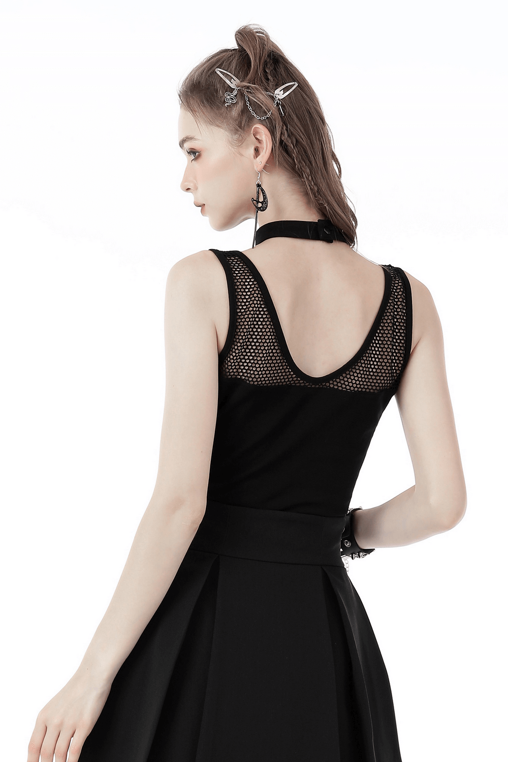 Edgy black sleeveless crop top with ribcage mesh detailing, perfect for a bold, gothic fashion statement.