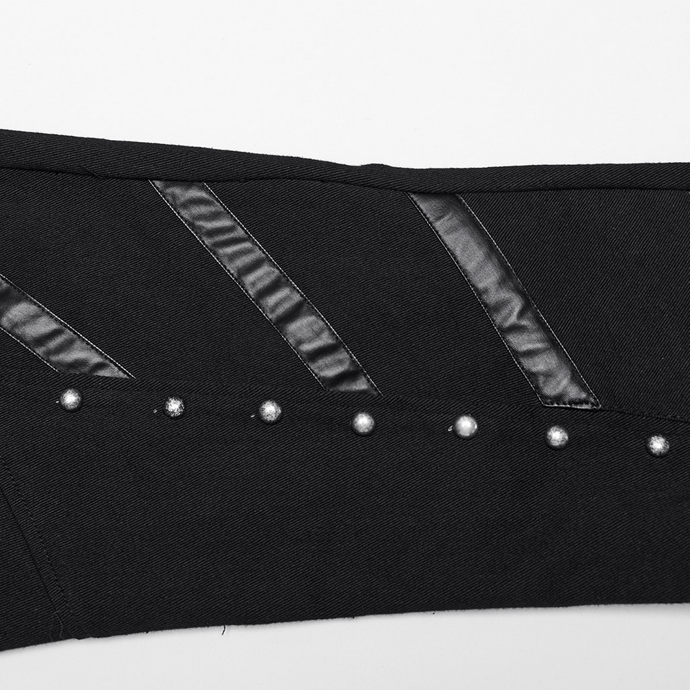 Close-up of punk flare trousers showcasing leather panels and rivets for a bold, edgy look.