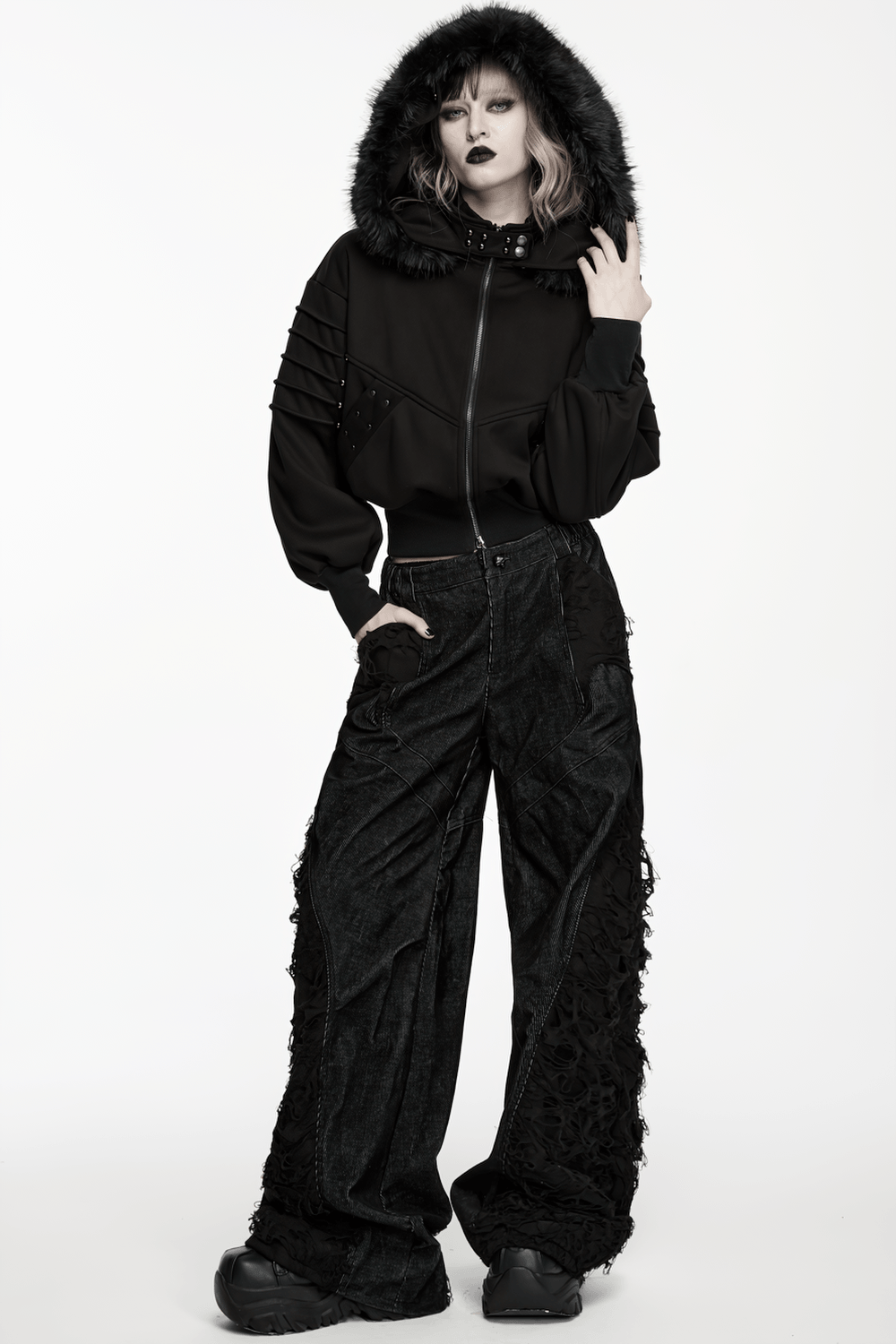 Punk Fleece Jacket with Fur Collar and Ribbed Trim worn with edgy black pants and dramatic makeup.