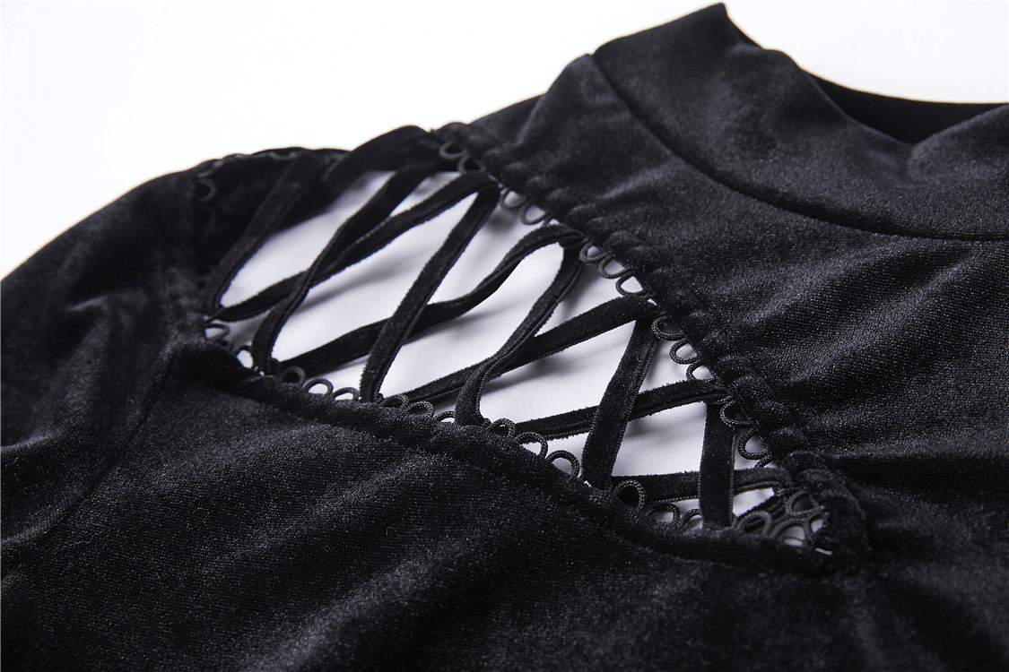 Close-up of lace-up detailing on a black velvet turtleneck, showcasing edgy goth style and luxurious texture.