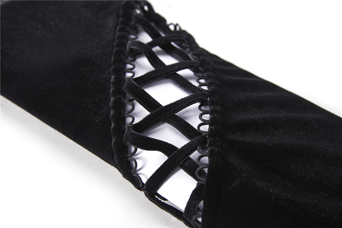 Close-up of lace-up detailing on a black velvet turtleneck, highlighting edgy goth fashion elements.