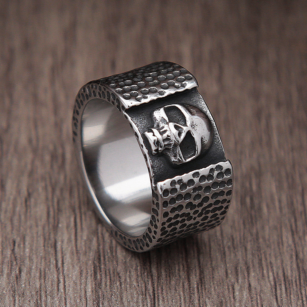 Unisex punk gothic stainless steel skull ring with textured band, perfect for bikers and edgy style lovers.