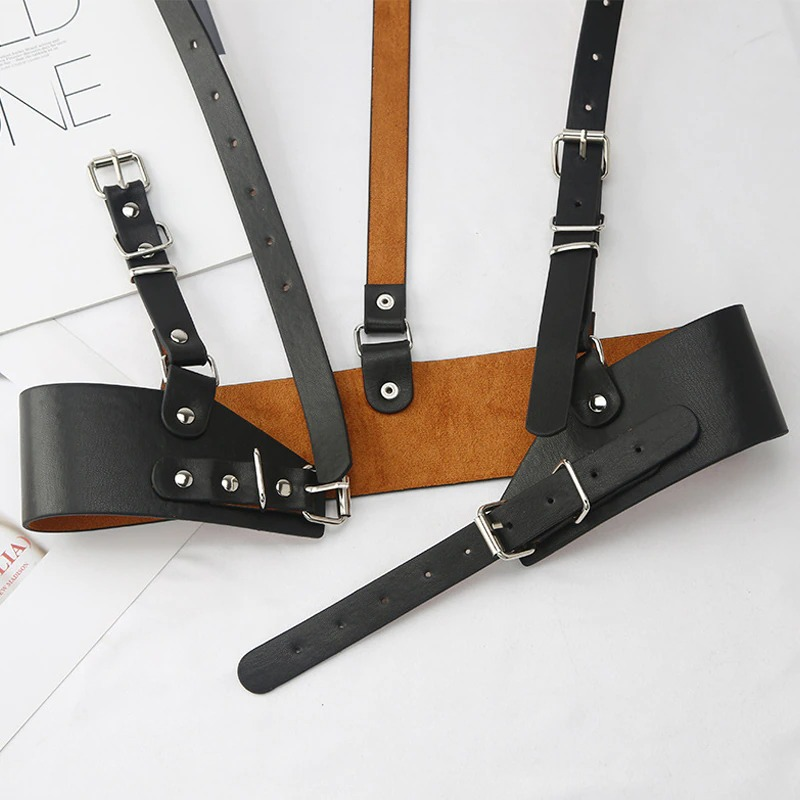 Punk gothic adjustable strap belt showcasing a stylish harness design in black and brown with silver fittings.