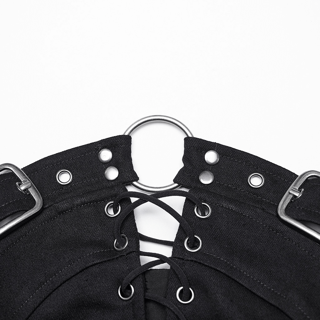 Close-up of black lace-up detailing on a punk gothic top featuring metal accents and adjustable loops.