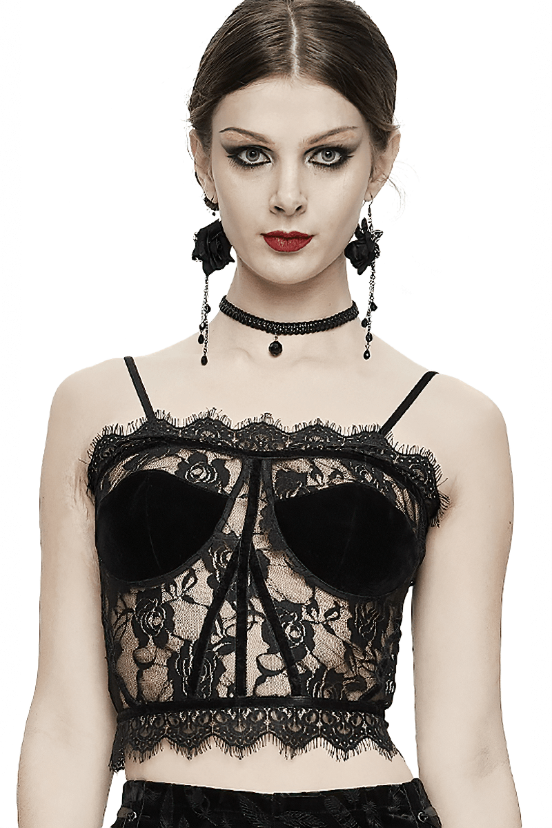 Stylish woman modeling a black lace crop top, showcasing gothic elegance and a sexy, delicate look.