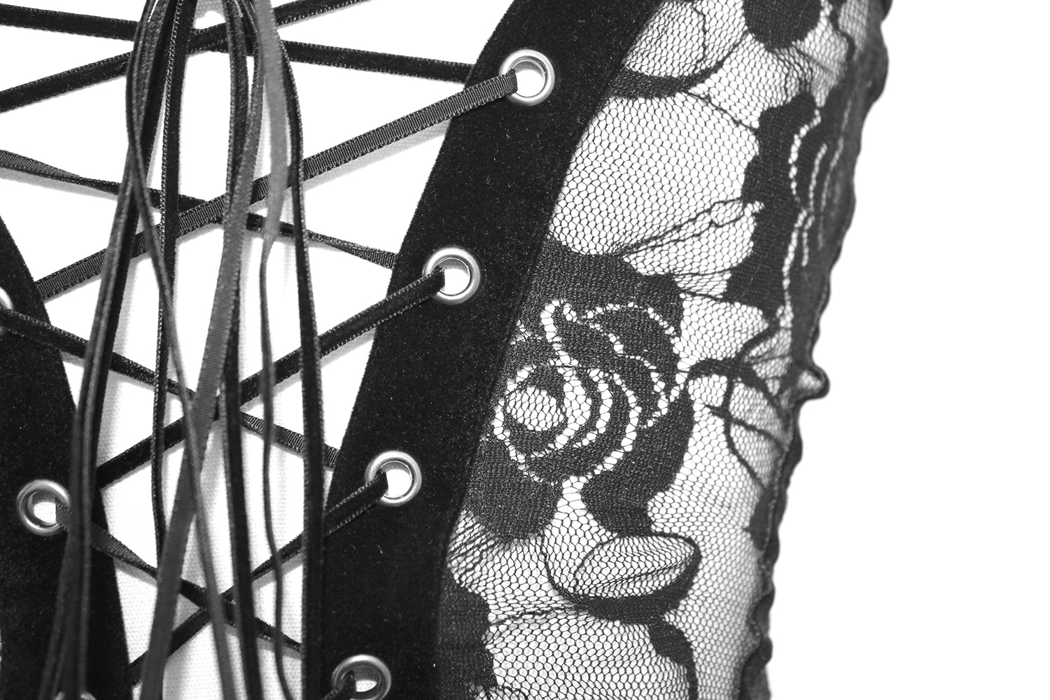 Black lace corset detail with floral pattern and sexy lace-up design for gothic outfits.