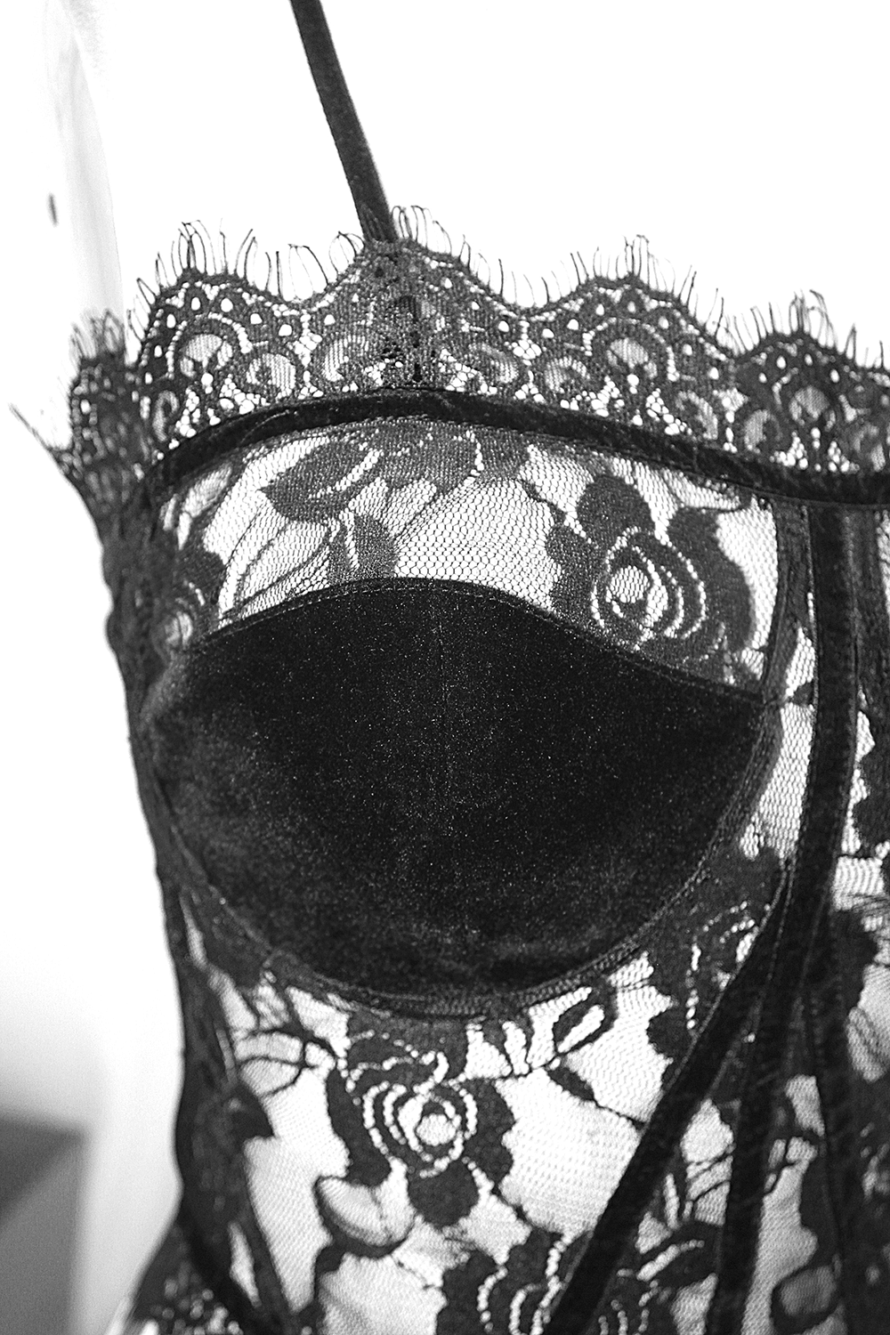 Black lace corset top showcasing elegant gothic style and intricate detailing, perfect for sexy women's outfits.