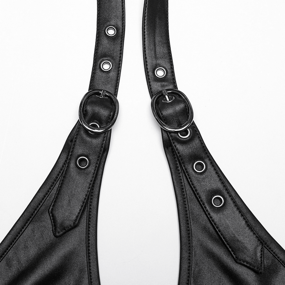 Close-up of punk halter neck dress straps featuring lace-up detail and metallic rings, showcasing edgy fashion design.