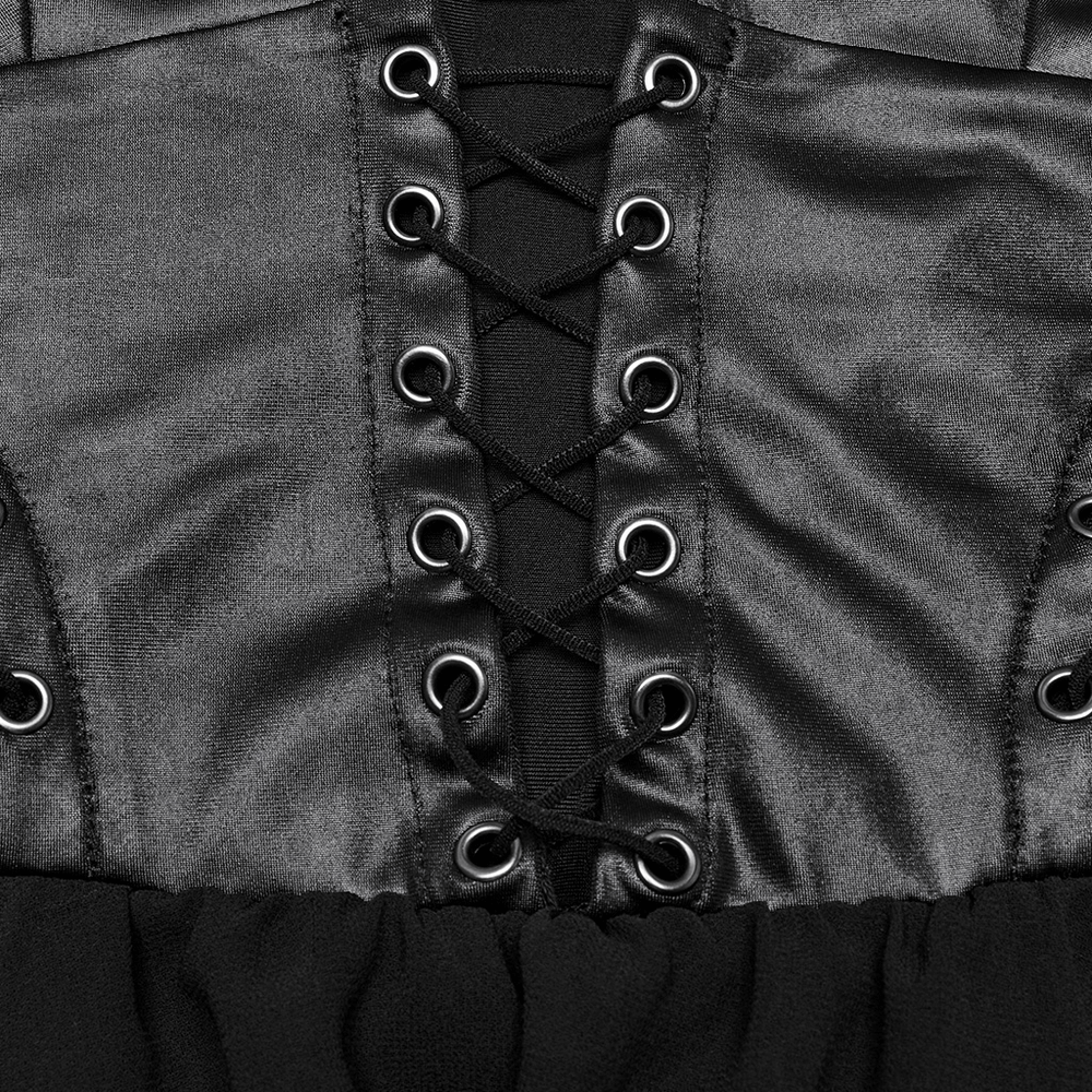 Close-up of punk halter neck dress featuring stylish lace-up detail and satin finish.