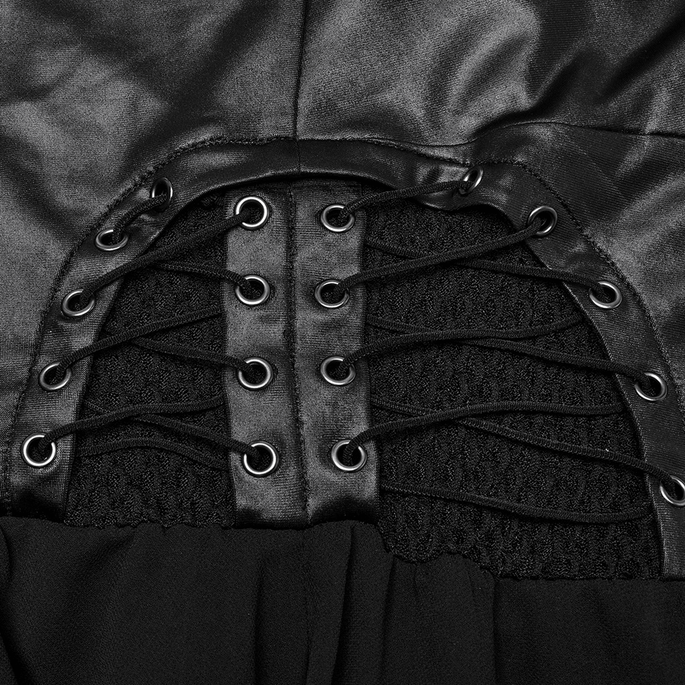 Close-up of punk halter neck dress showing lace-up detail and mesh fabric accent.