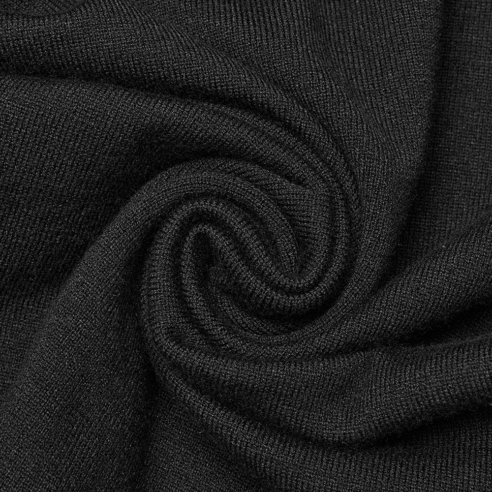 Close-up of soft black ribbed fabric showcasing its texture for the Punk Harness Ribbed Dress Set.