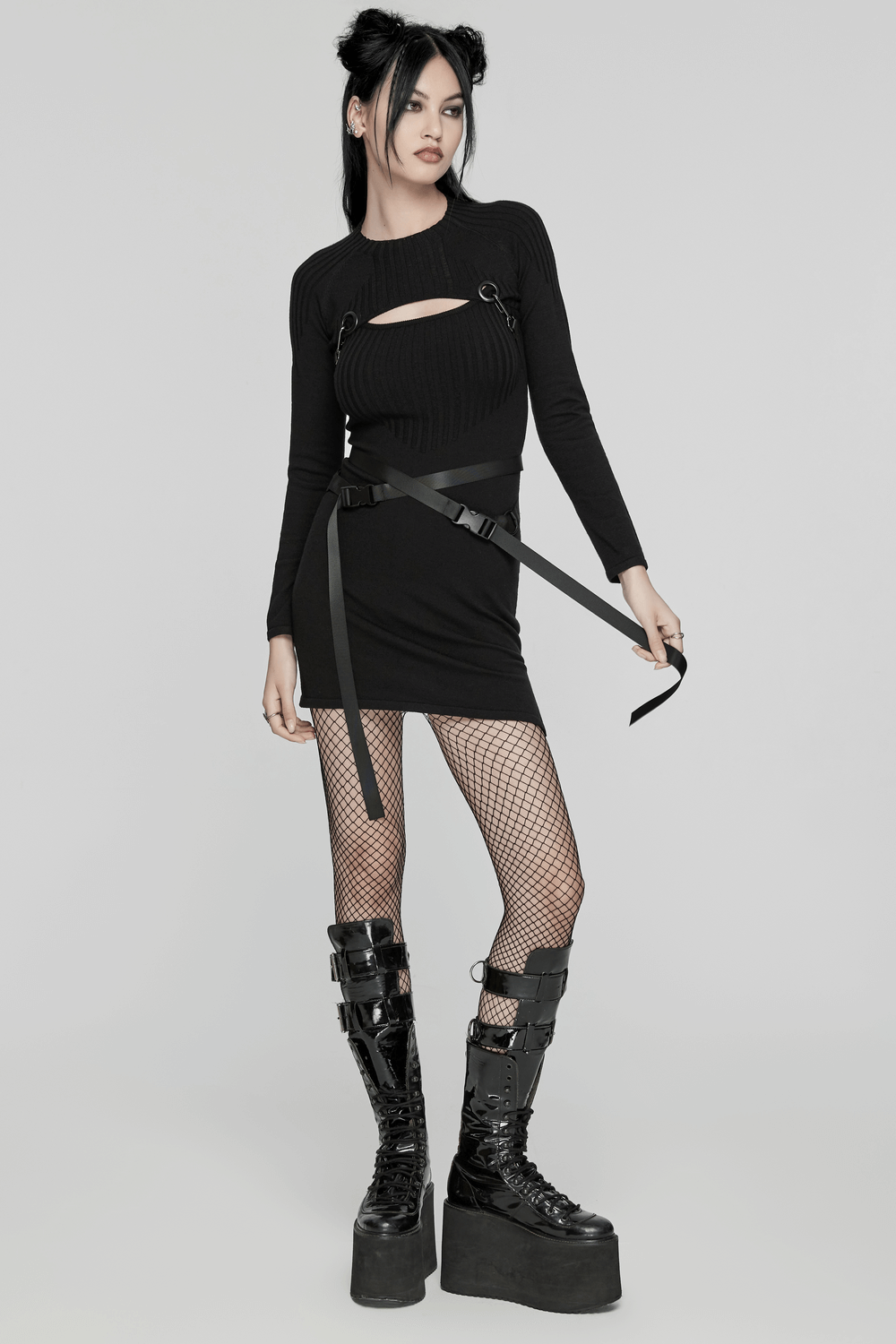 Punk ribbed dress set with harness detailing and fishnet tights, paired with platform boots for an edgy look.
