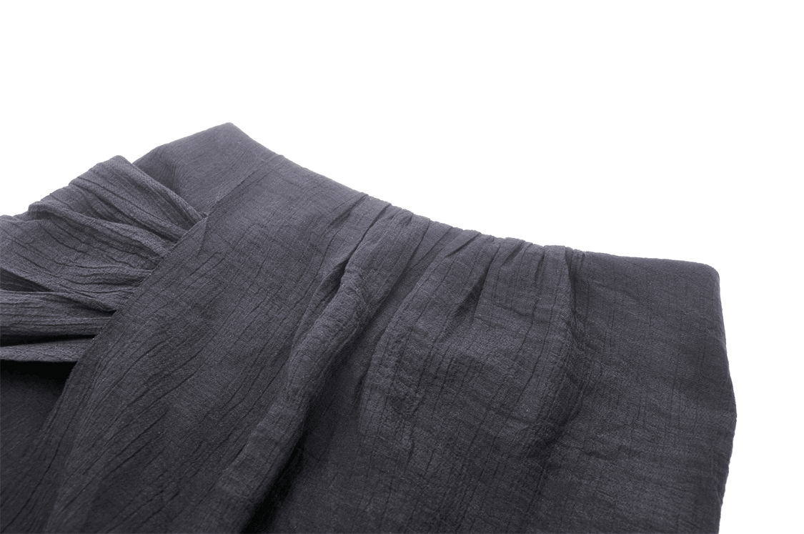 Close-up of the black punk high-low skirt showcasing ruffled hem and fabric texture, perfect for gothic fashion lovers.