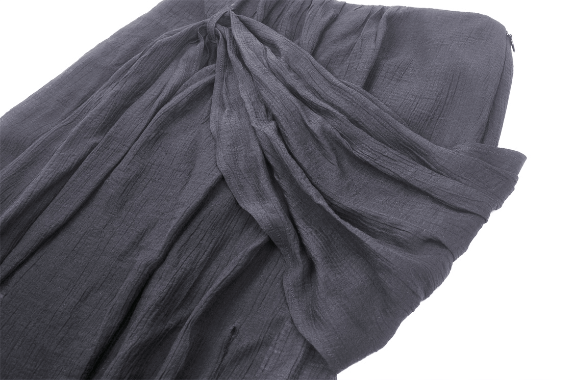 Soft black linen fabric draped elegantly, perfect for a punk high-low skirt with lace details.