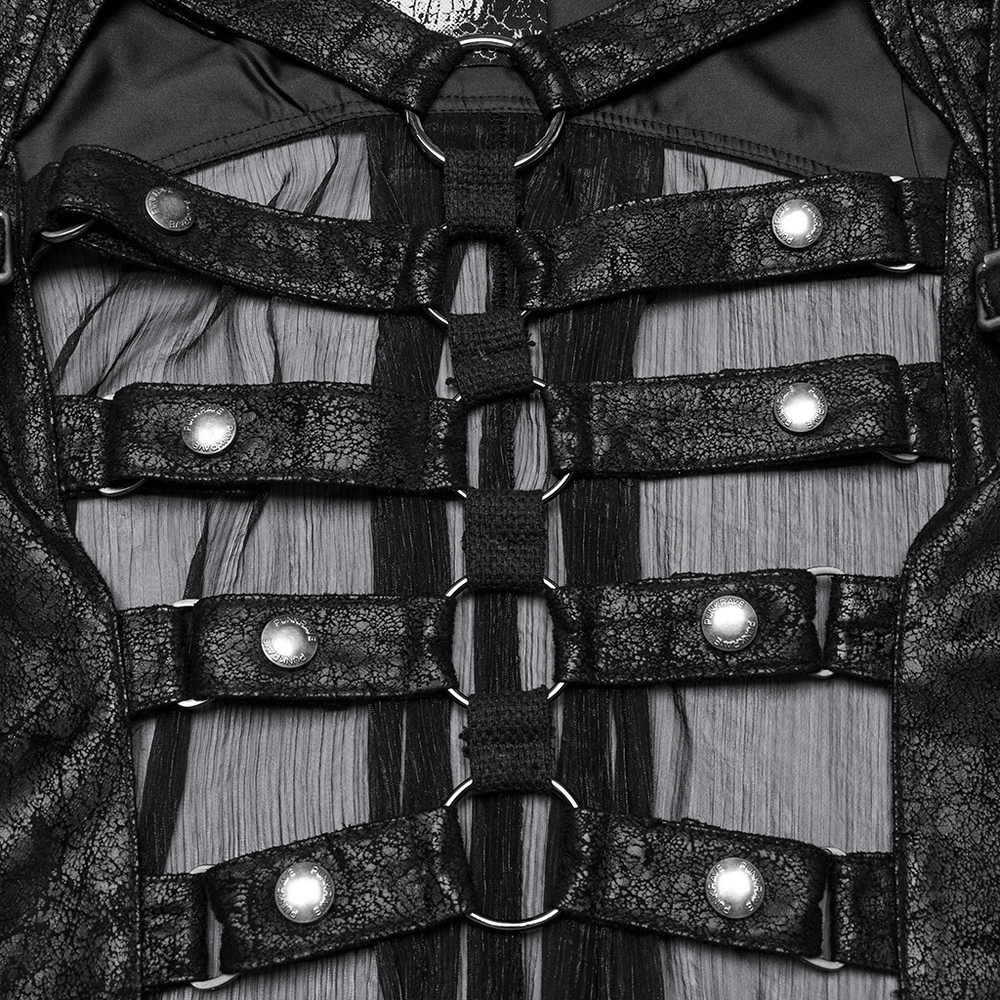 Close-up of punk hooded skeleton cape detailing, featuring cracked faux leather, buckles, and metal rings.