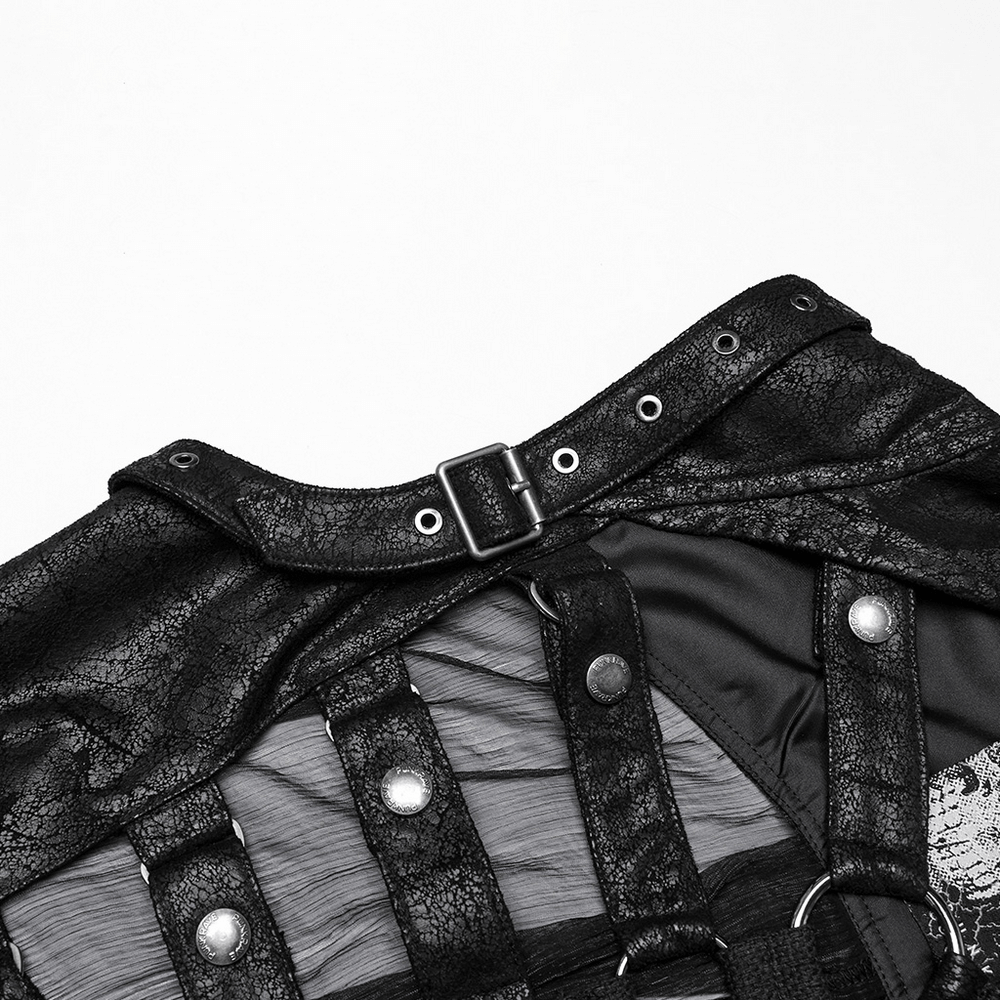 Close-up of punk hooded skeleton cape detail with buckles, black faux leather, and sheer webbing design.