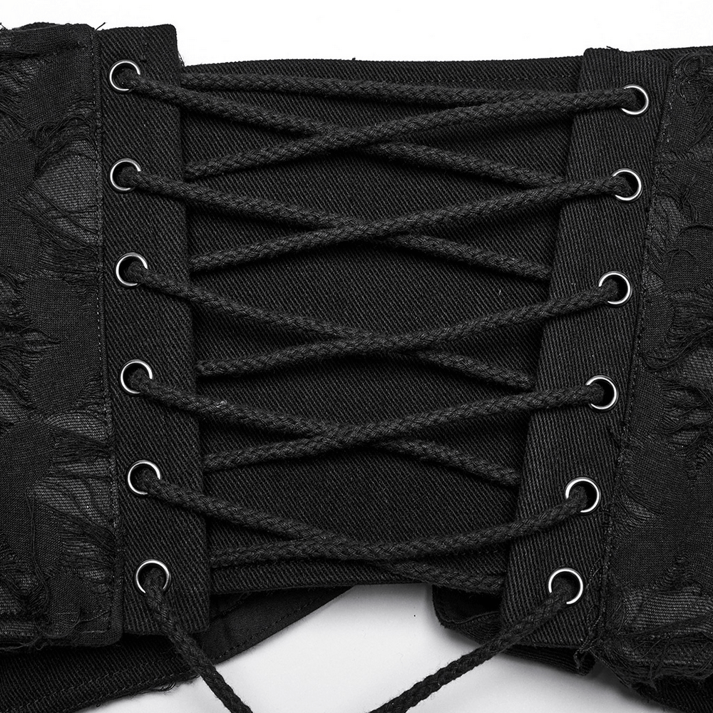 Close-up of punk interlaced corset belt showing intricate black lacing and eyelets for waist cinching.