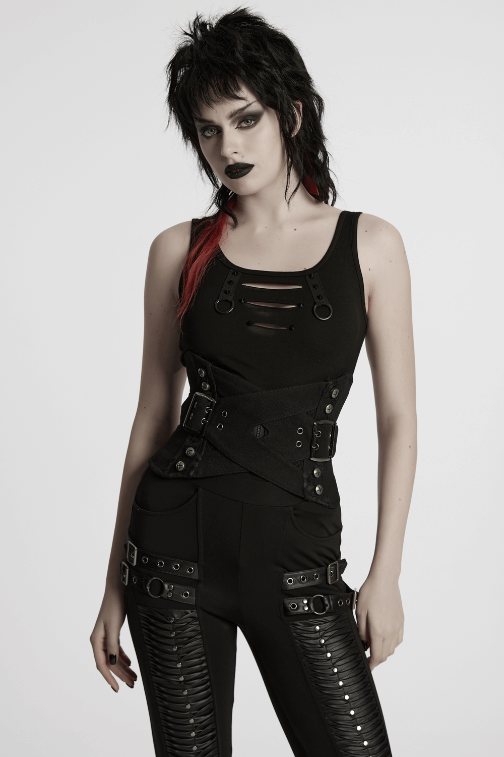 Gothic punk model wearing a black corset belt with buckles and metal studs, showcasing a bold, edgy style.