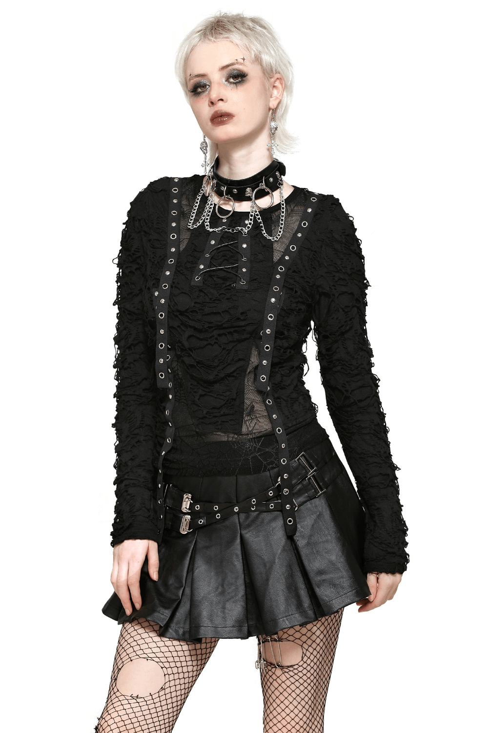 Punk lace-up top with ripped sleeves, layered over a leather skirt, showcasing gothic style and edgy fashion.