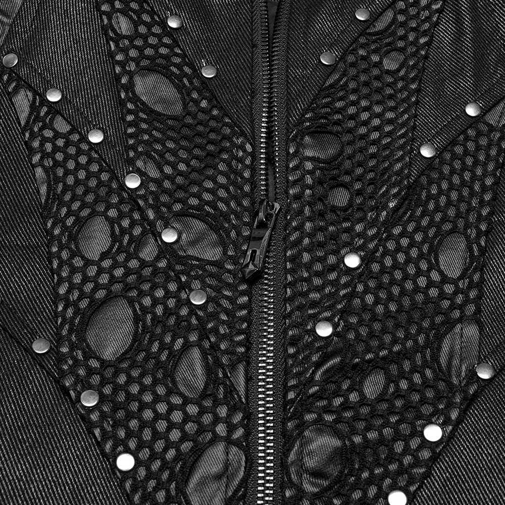 Close-up of punk vest with rivet detailing and mesh design, showcasing unique patchwork and bold aesthetic.