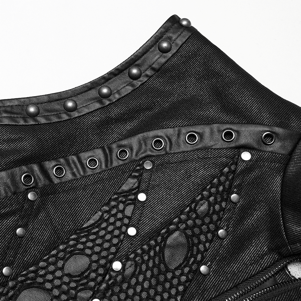 Close-up of punk leather vest with rivet detailing and unique patchwork design on a sleek black background.