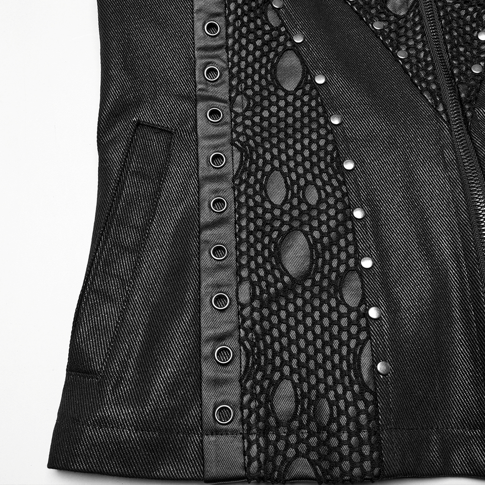 Close-up of a punk leather vest featuring unique patchwork, rivet details, and textured twill fabric for a bold, edgy look.
