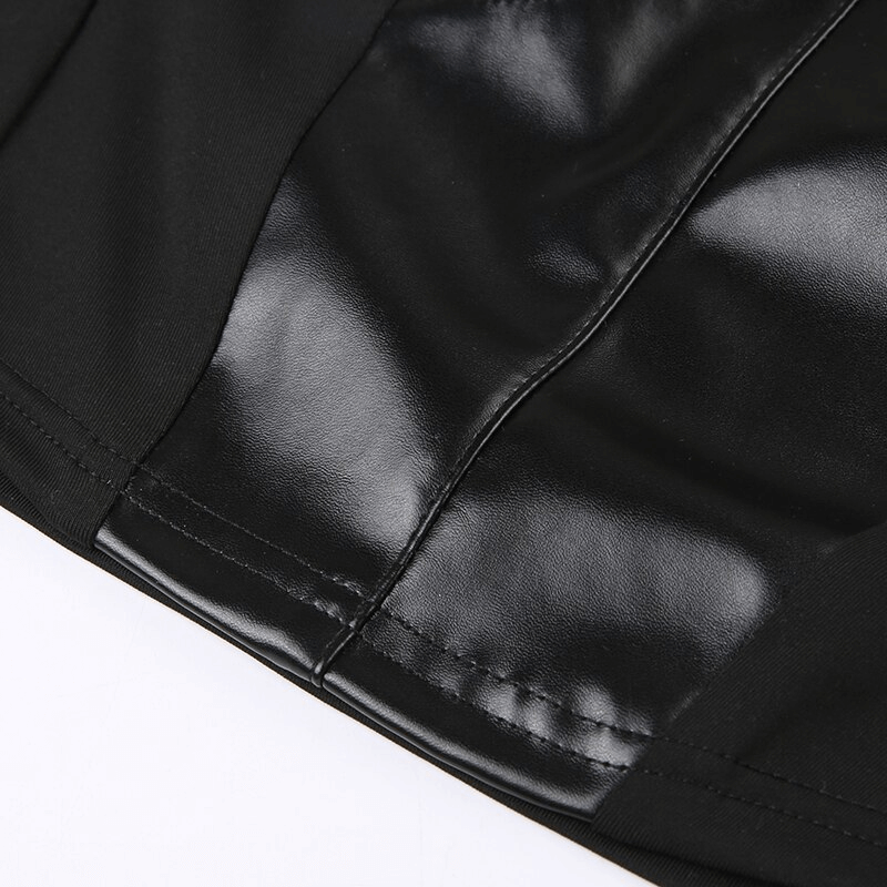 Close-up of the punk women's sleeveless patchwork crop top showcasing glossy leather texture and unique design features.