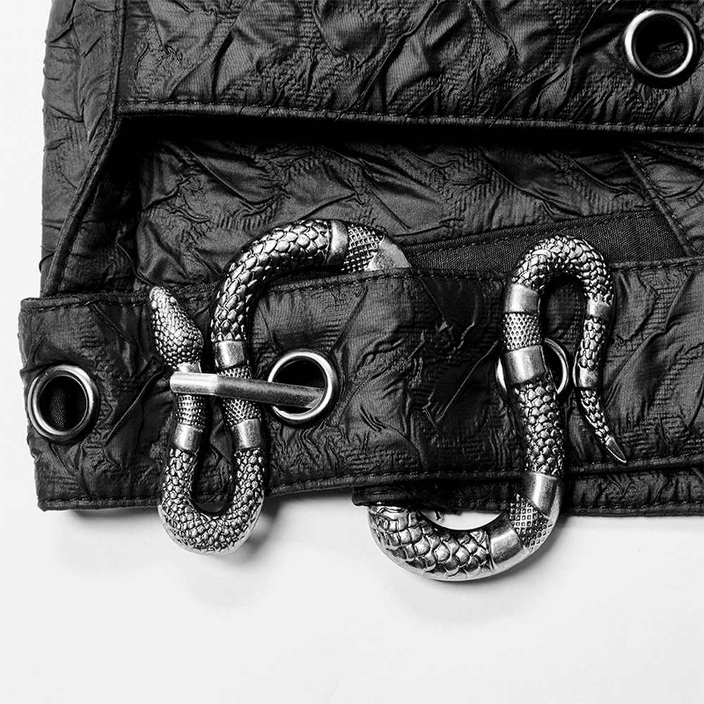 Gothic leather body harness with embossed fabric and metal snake buckle details.