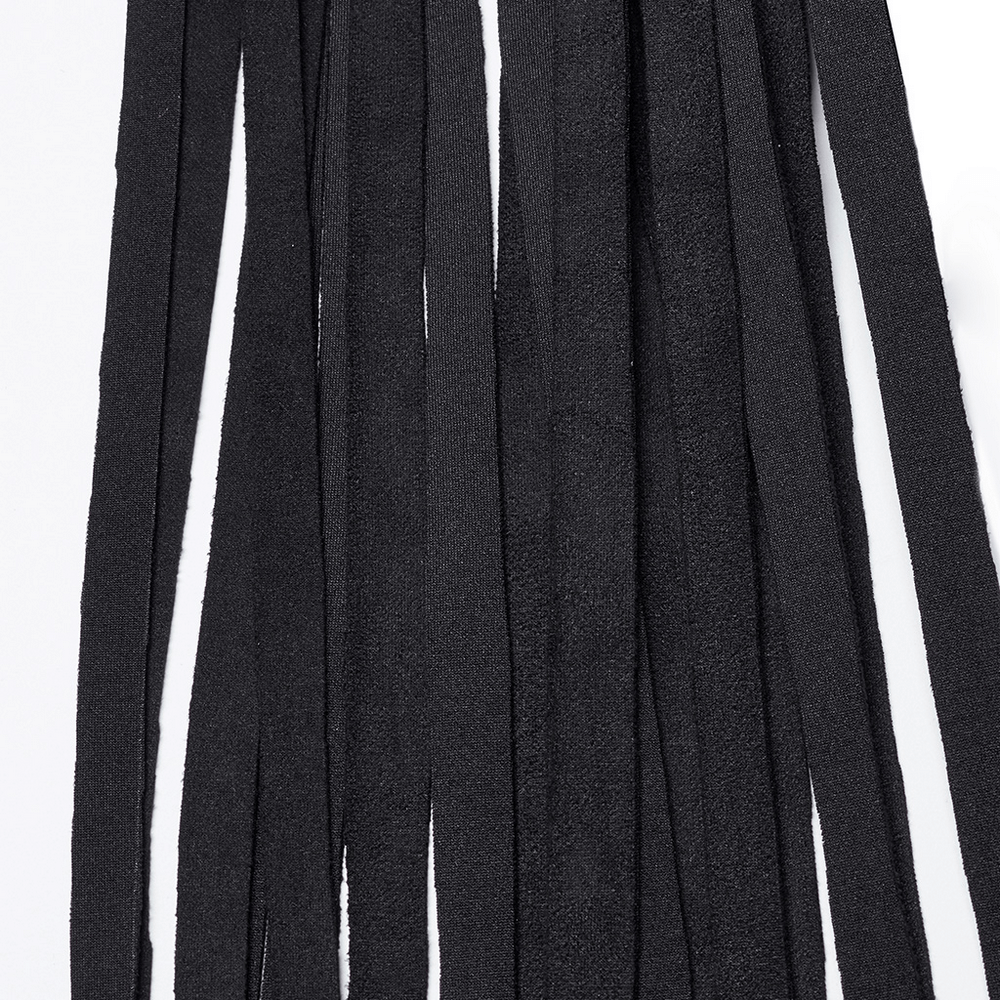 Close-up of black suede tassels for punk leather shoulder armor, perfect for edgy fashion statements.