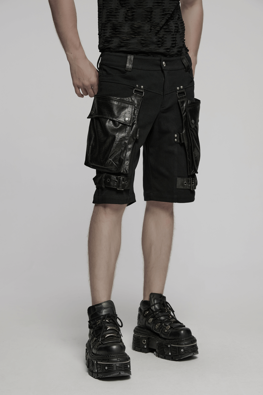 Punk leather trimmed black shorts with oversized pockets, perfect for edgy street style.