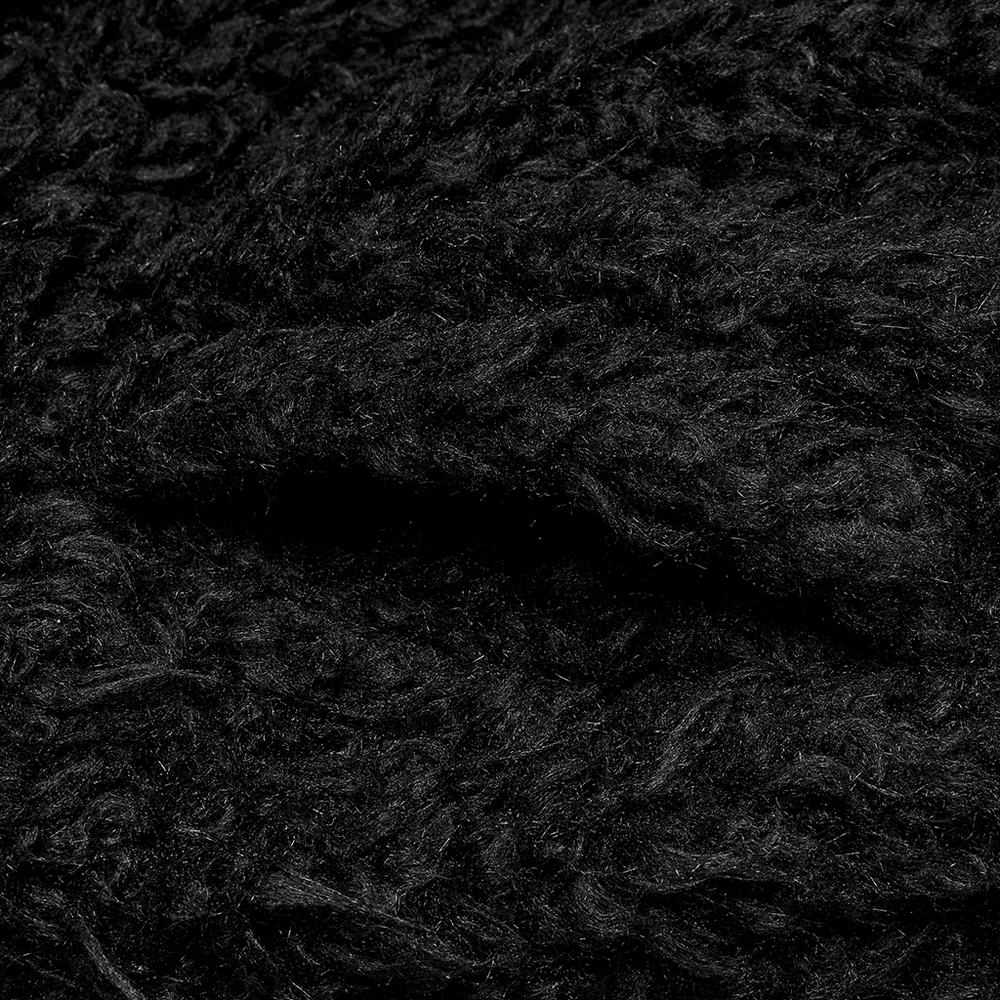Close-up texture of soft black faux fur fabric, perfect for edgy punk style jackets.