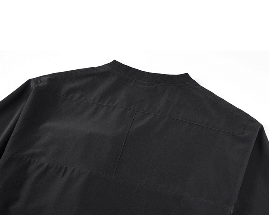 Back view of a punk loose solid T-shirt for men, showcasing oversized streetwear fashion in sleek black.
