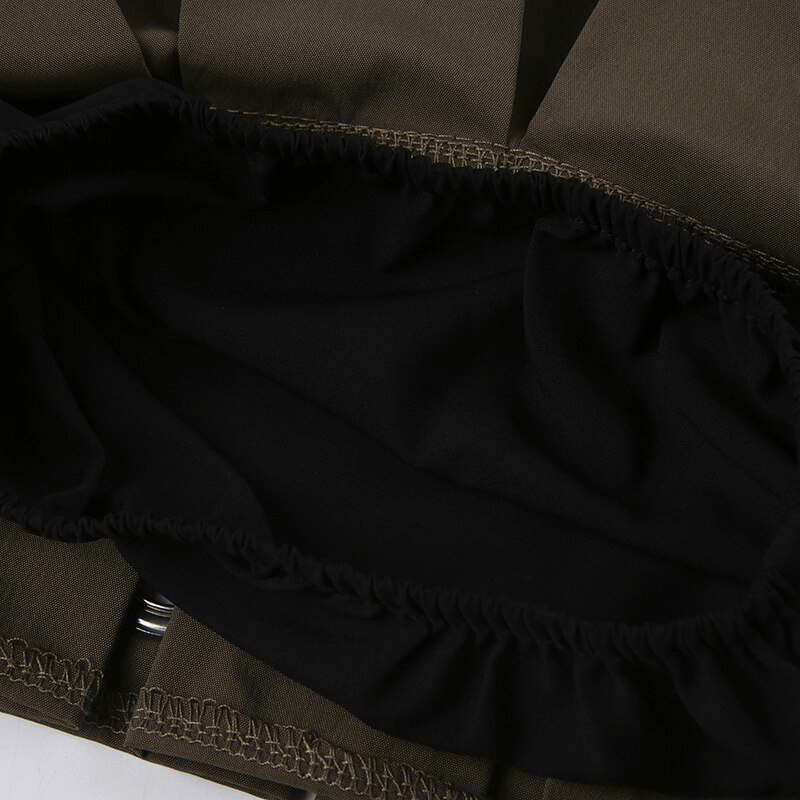 Inner view of punk low rise pleated shorts-skirt, showcasing the black lining and elastic waistband design.