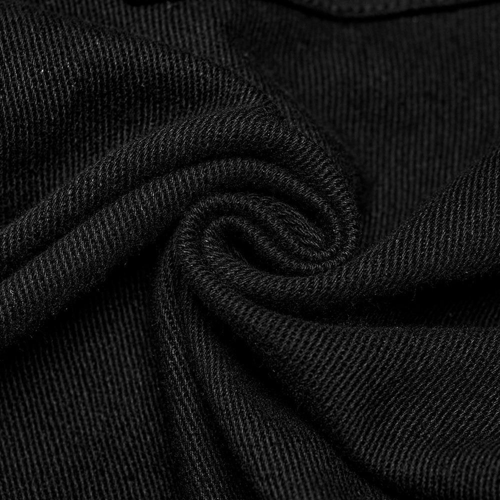 Close-up of soft black twill fabric, showcasing its texture and elasticity for punk men's pants style.