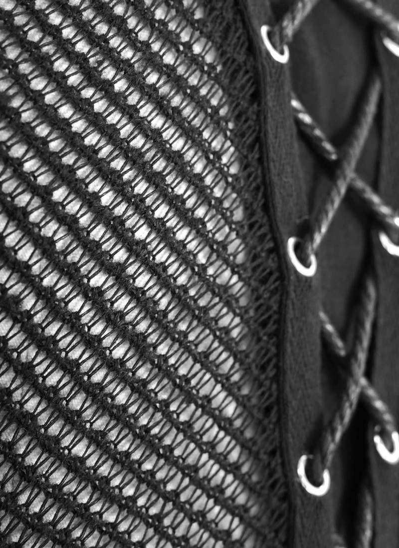 Close-up of black punk men's tank top showcasing mesh and drawstring details for a trendy look.