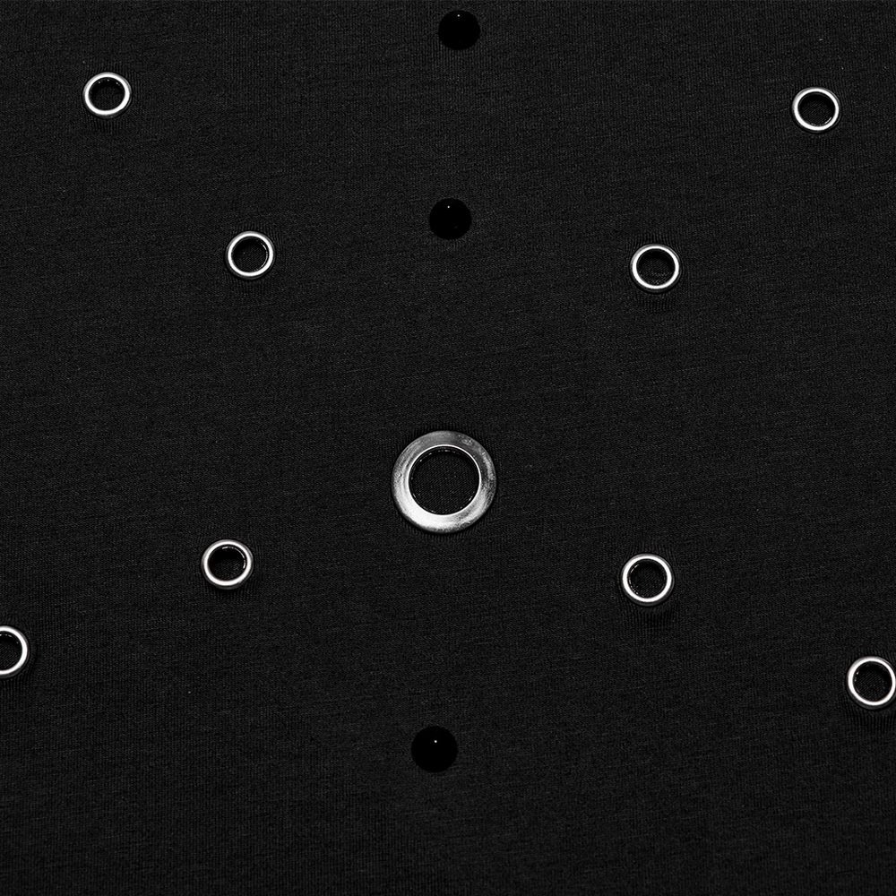 Close-up of spikes and eyelets on a black fabric, adding edgy details to a punk men's high-collar top.