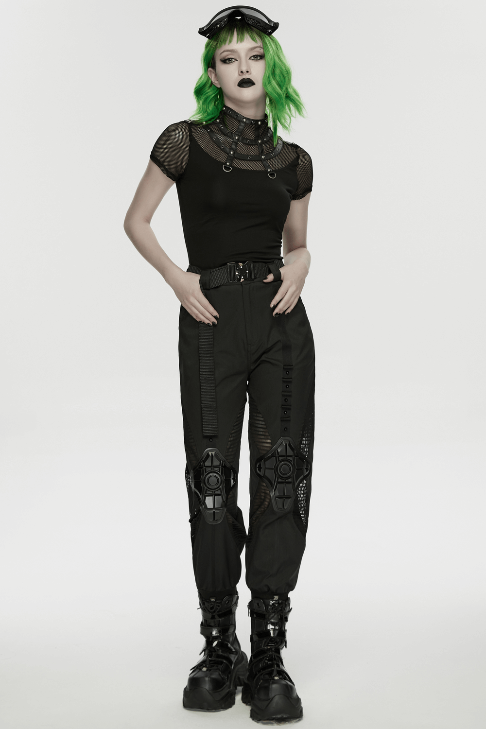 Punk Mesh Cage T-Shirt with Stand Up Collar and Zipper showcased with edgy pants and bold hairstyle in a striking outfit.