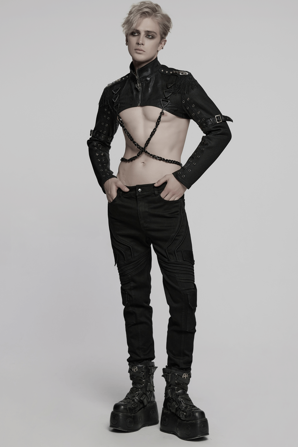 Model showcasing a punk mesh cropped jacket with chains and buckle details, styled for alternative fashion.