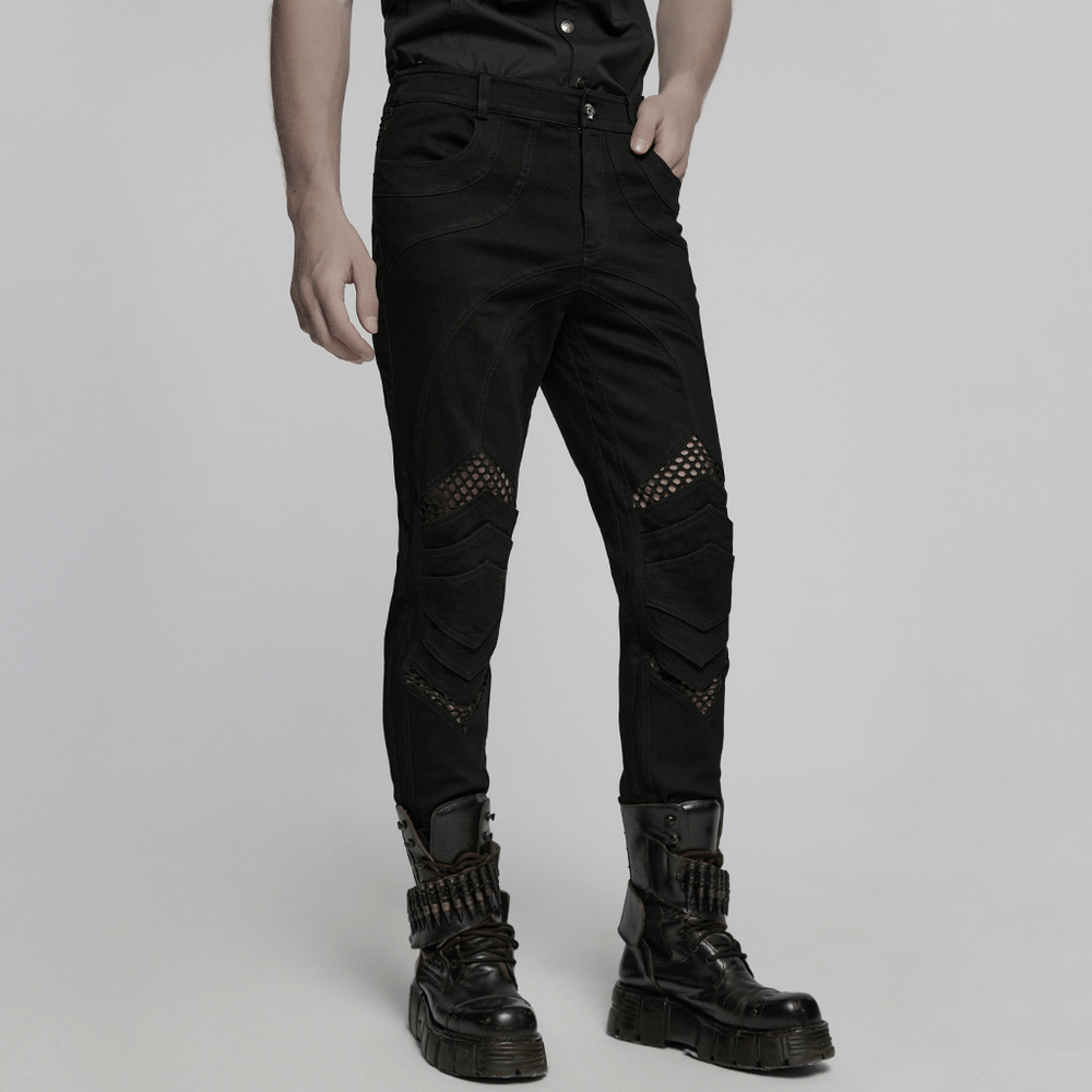 Punk mesh detail tight pants with 3D knee pieces, paired with bold black boots for an edgy look.